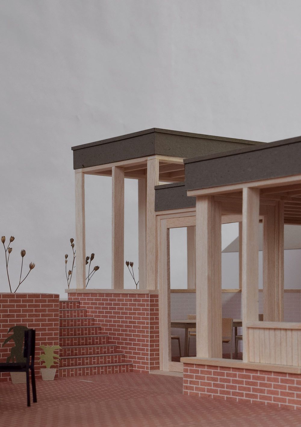 External model photograph for From Work's stepped brick and timber rear extension.
