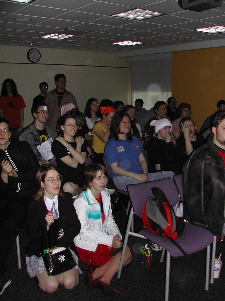 A screening at Animarathon III. Many guests are posing for the camera.