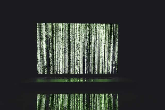 Neon code on laptop screen