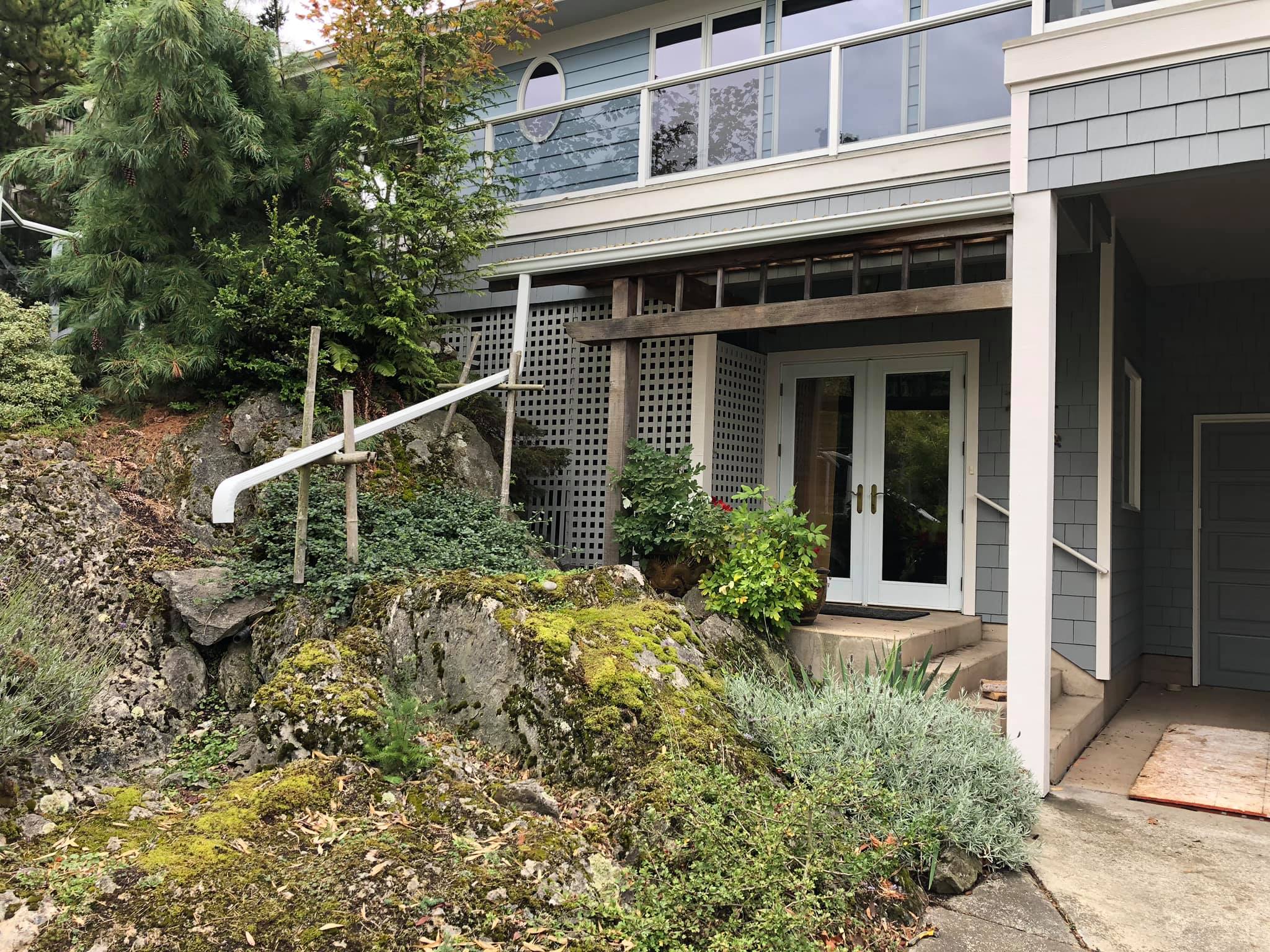 old home with a new metal gutter system