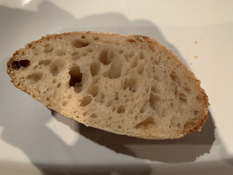 A slice of my first sourdough loaf. It has good structure and a fine crust.