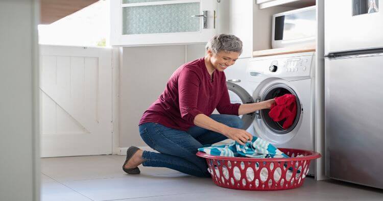 Woman Using Washing Machine