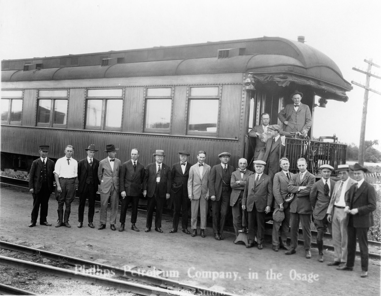 Frank Phillips (on bottom step) and other oilmen arrive in Osage territory in 1919.