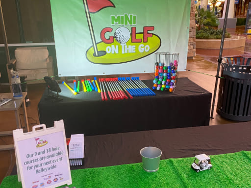 Mini Golf On The Go tent and table.