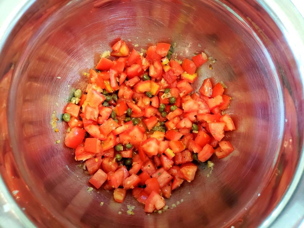 Bowl with tomato caper bruschetta