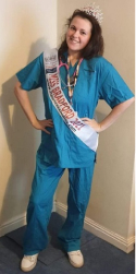 Dr Saskia Fauguel in scrubs with Miss Bradford winner sash