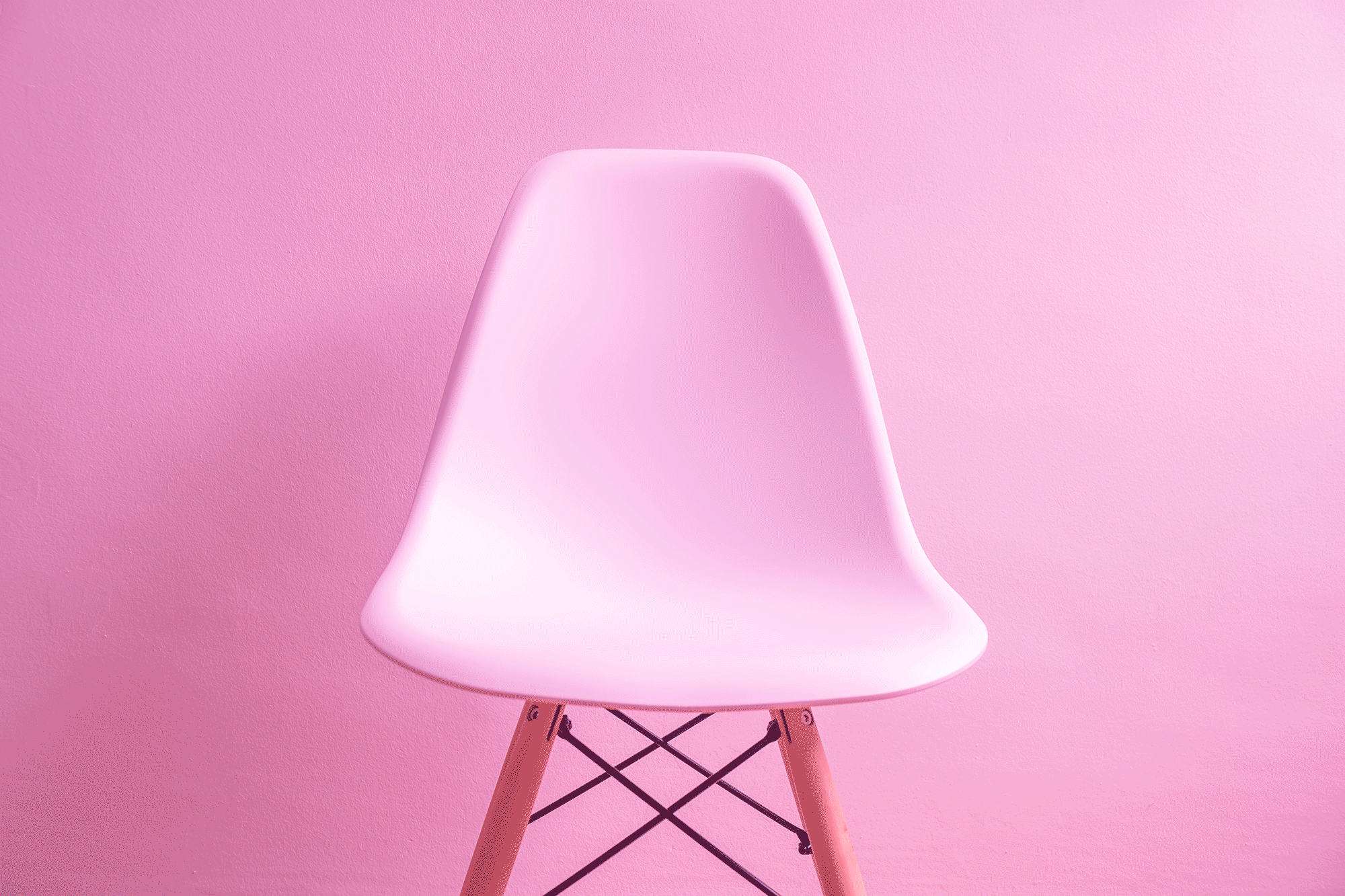 chair on pink background for the article Freedom of Choice: Dealing With Variant Limits in Shopify