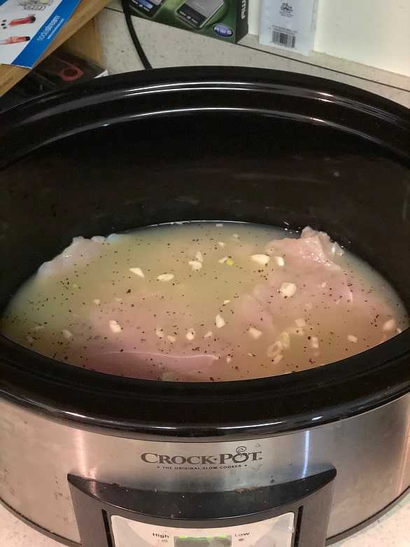 Crock pot with chicken breasts