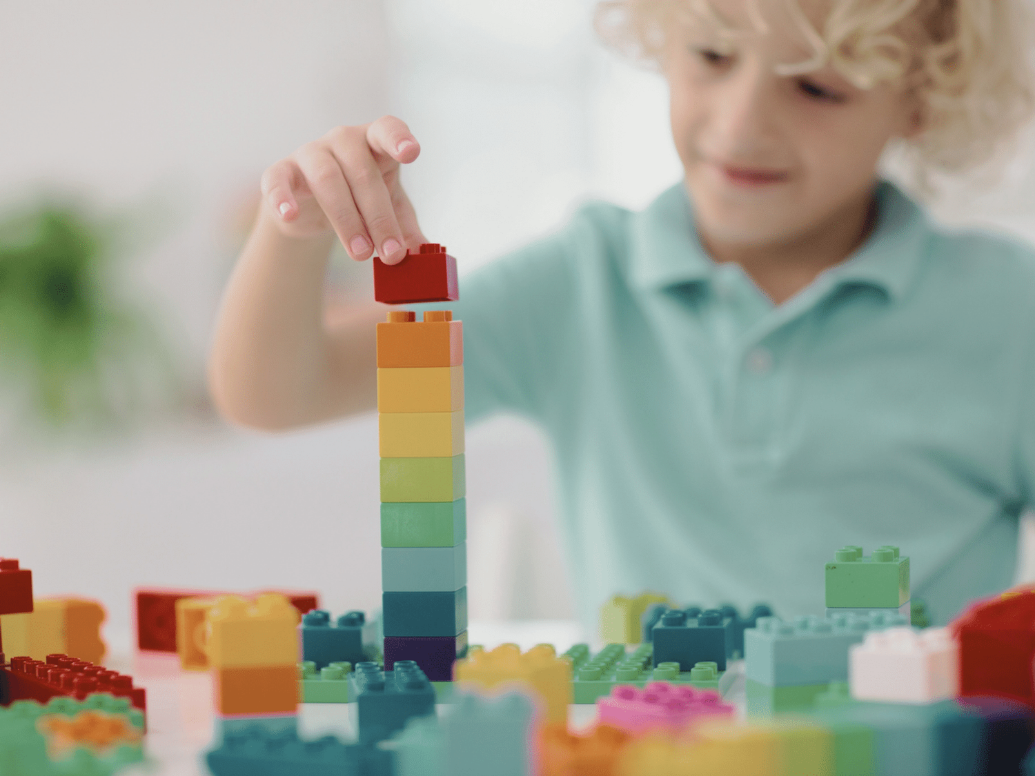 Child playing with building blocks.