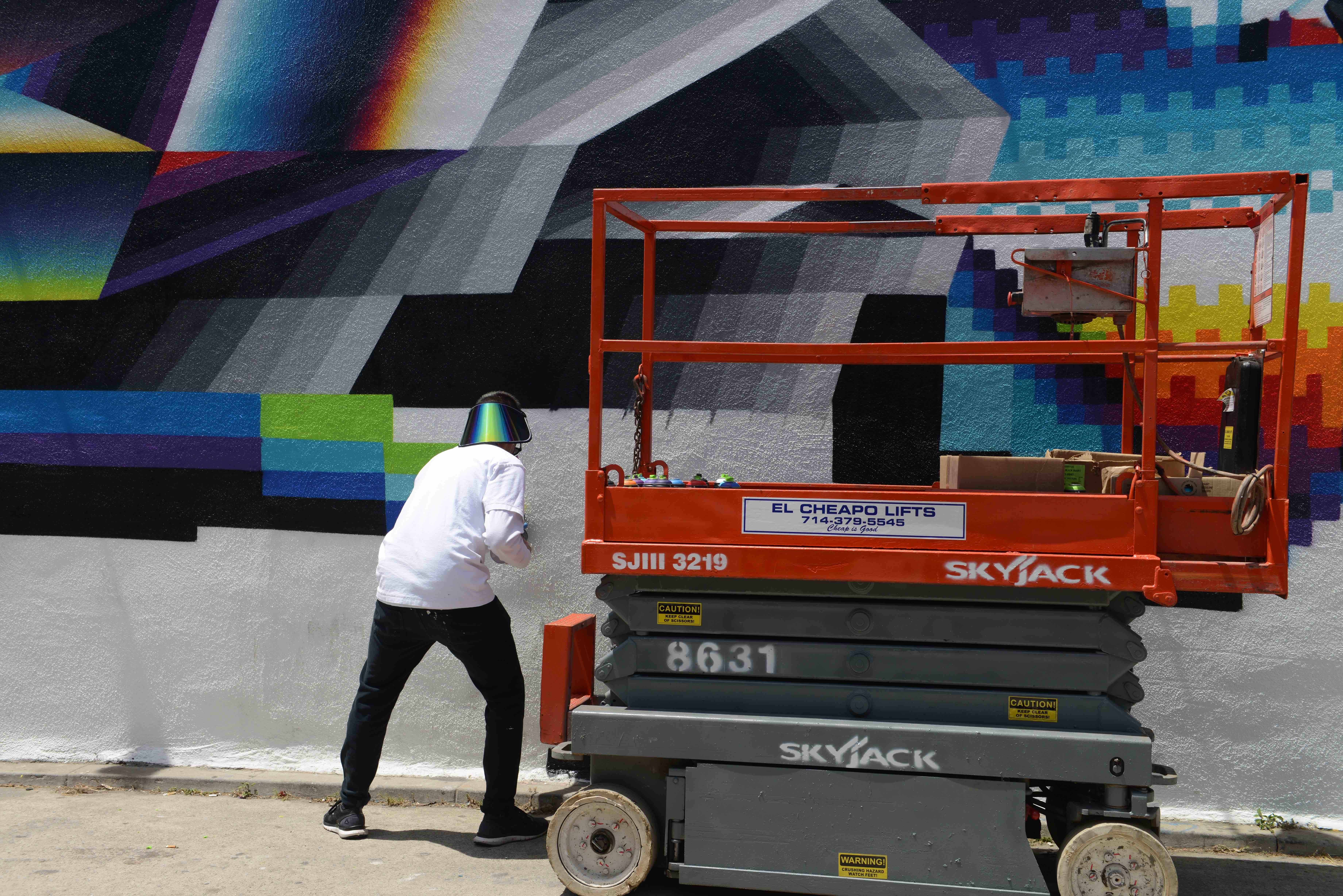 Felipe Pantone in the moment painting on AK