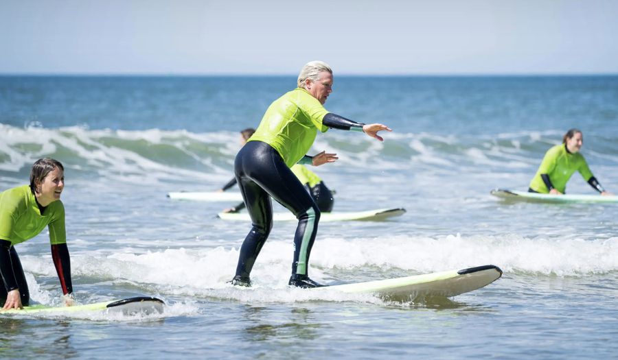 women on surf board