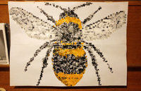 Bee painting made from paint dots.