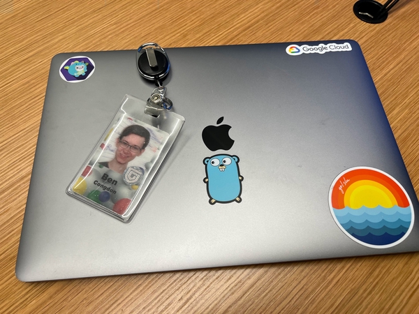 Obligatory badge-and-laptop goodbye photo