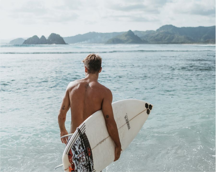 man with surf board