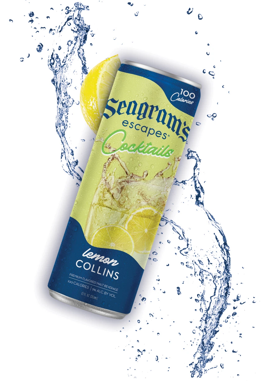 can of Lemon Collins with a splash of cool water and pieces of Lemon in the background