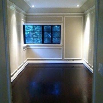 newly painted toom with dark brown hardwood floors
