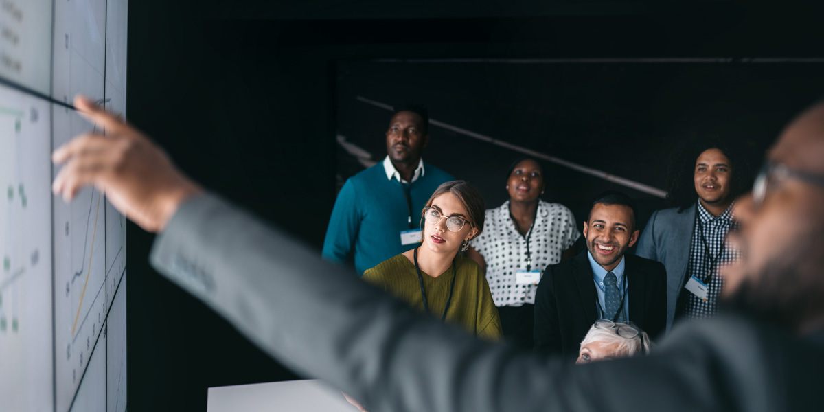 What is Poisson distribution? A group of data analysts looking at a graph on an interactive whiteboard A group of data analysts looking at a graph on an interactive whiteboard