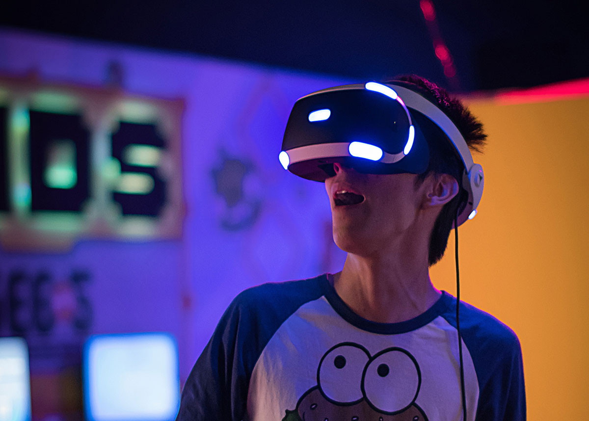 kid playing with a VR set