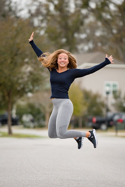 Kristie Lengel jumping in the street.