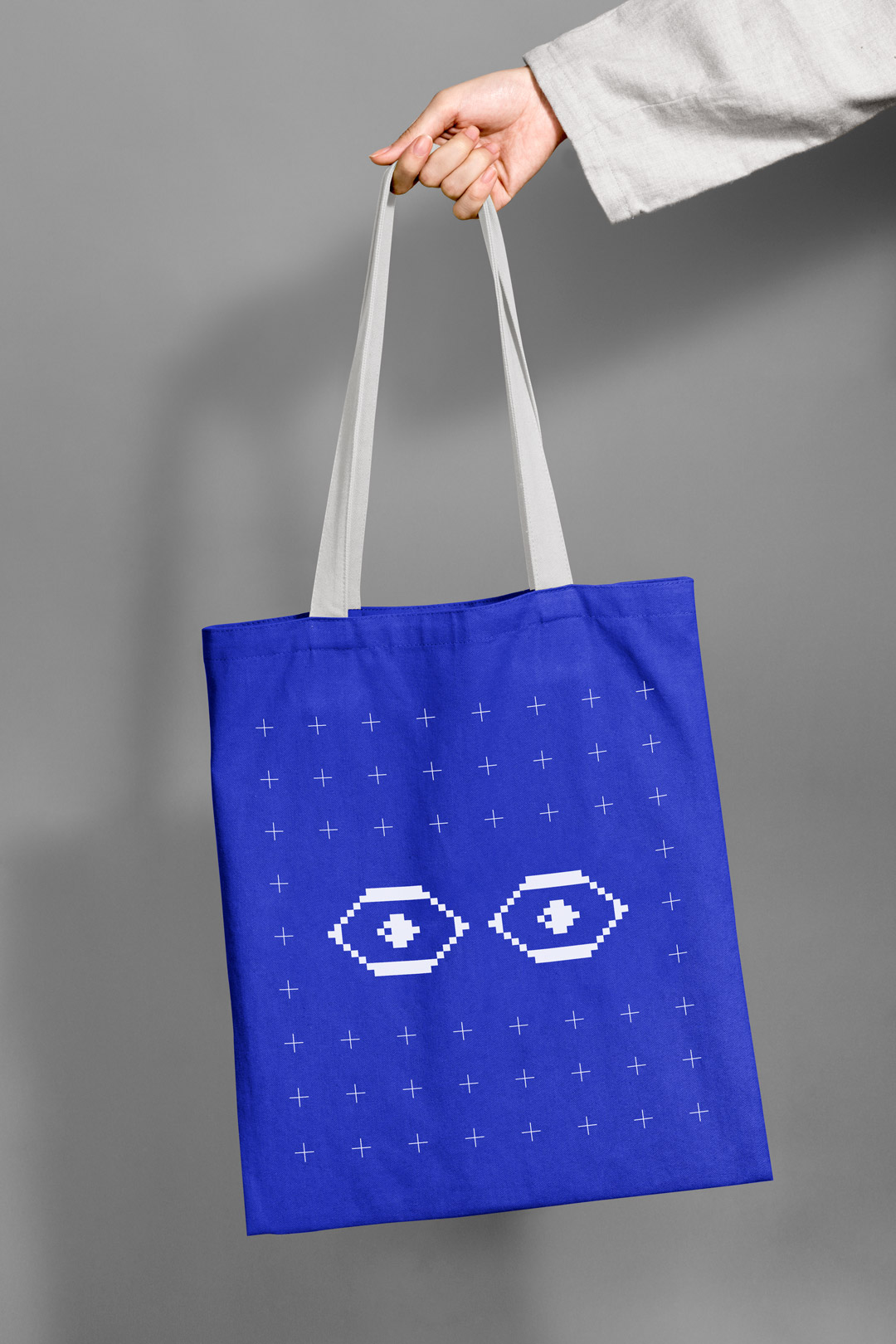 Tote bag with festival graphics.