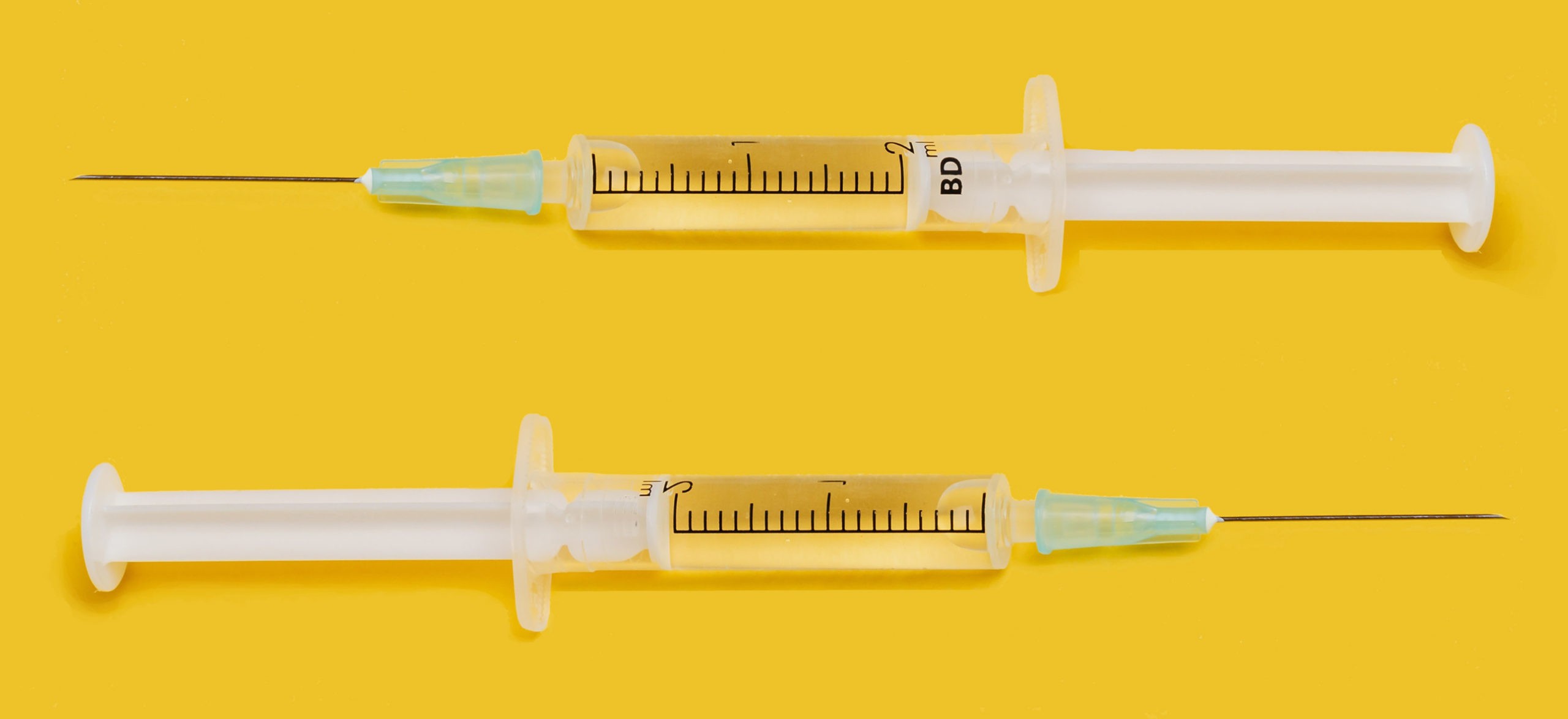 Two syringes with the COVID-19 vaccines.