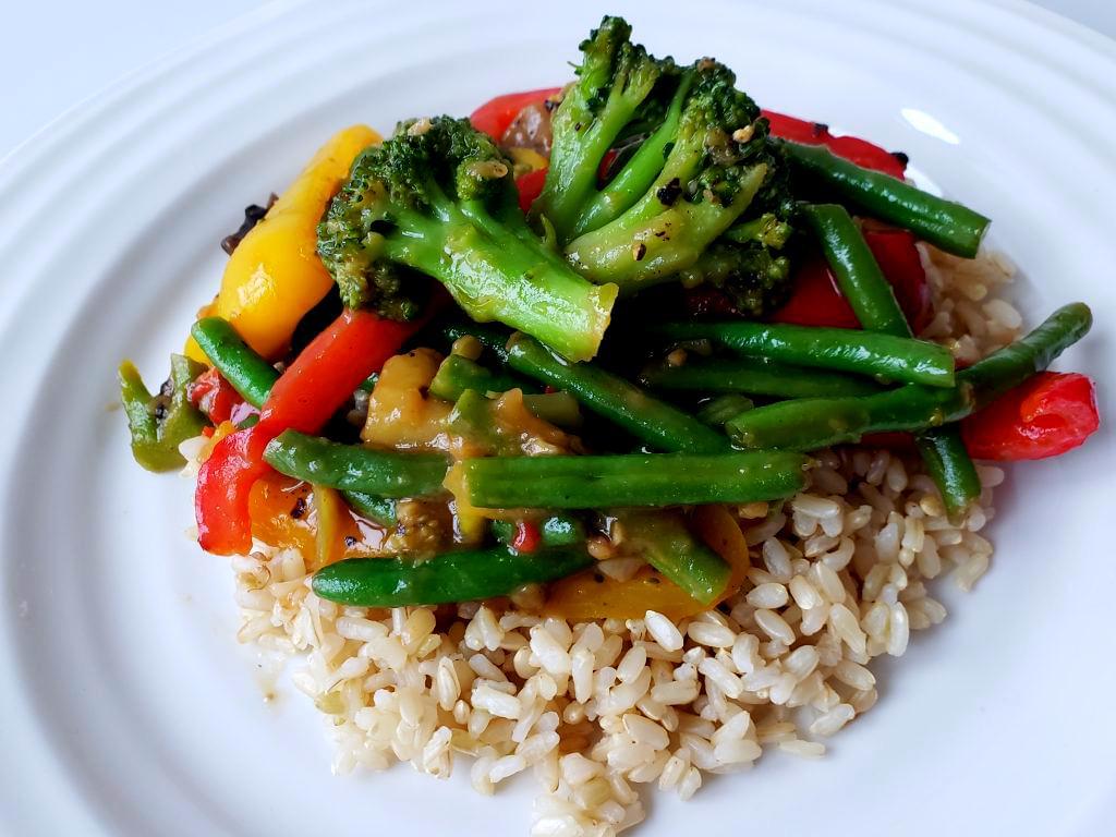 Plate with stir-fry vegetbales over rice
