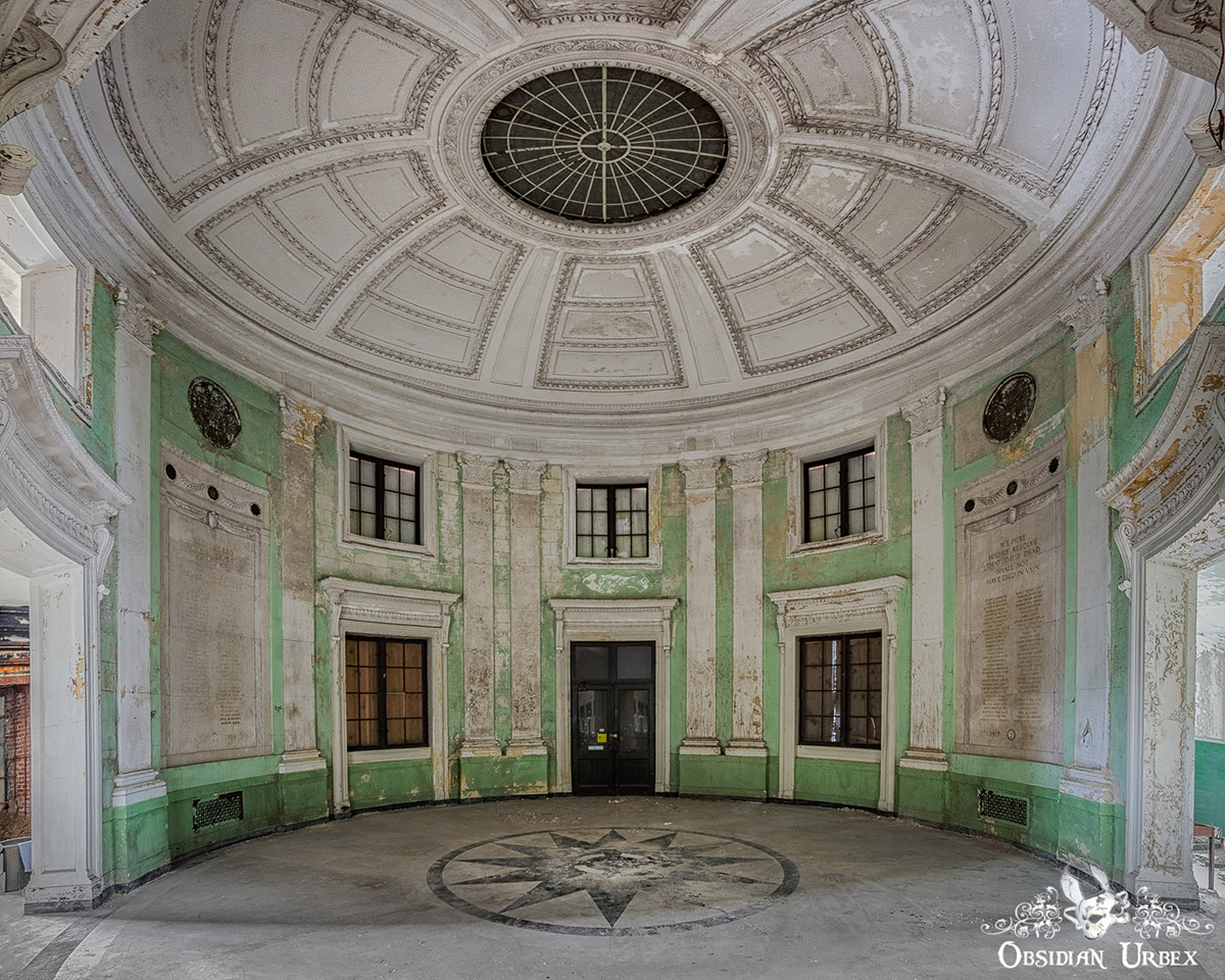 abandoned town hall with mint green rotunda