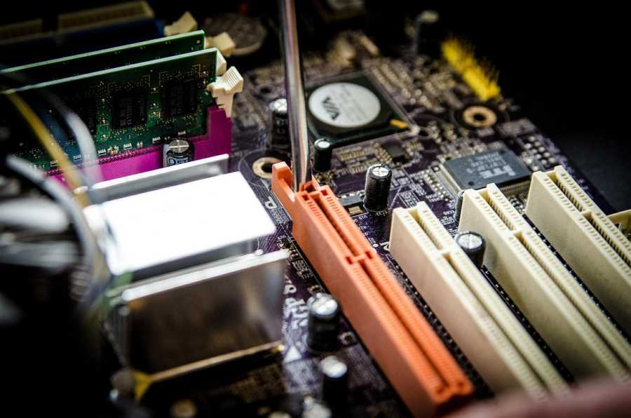 IT technician completing computer repair