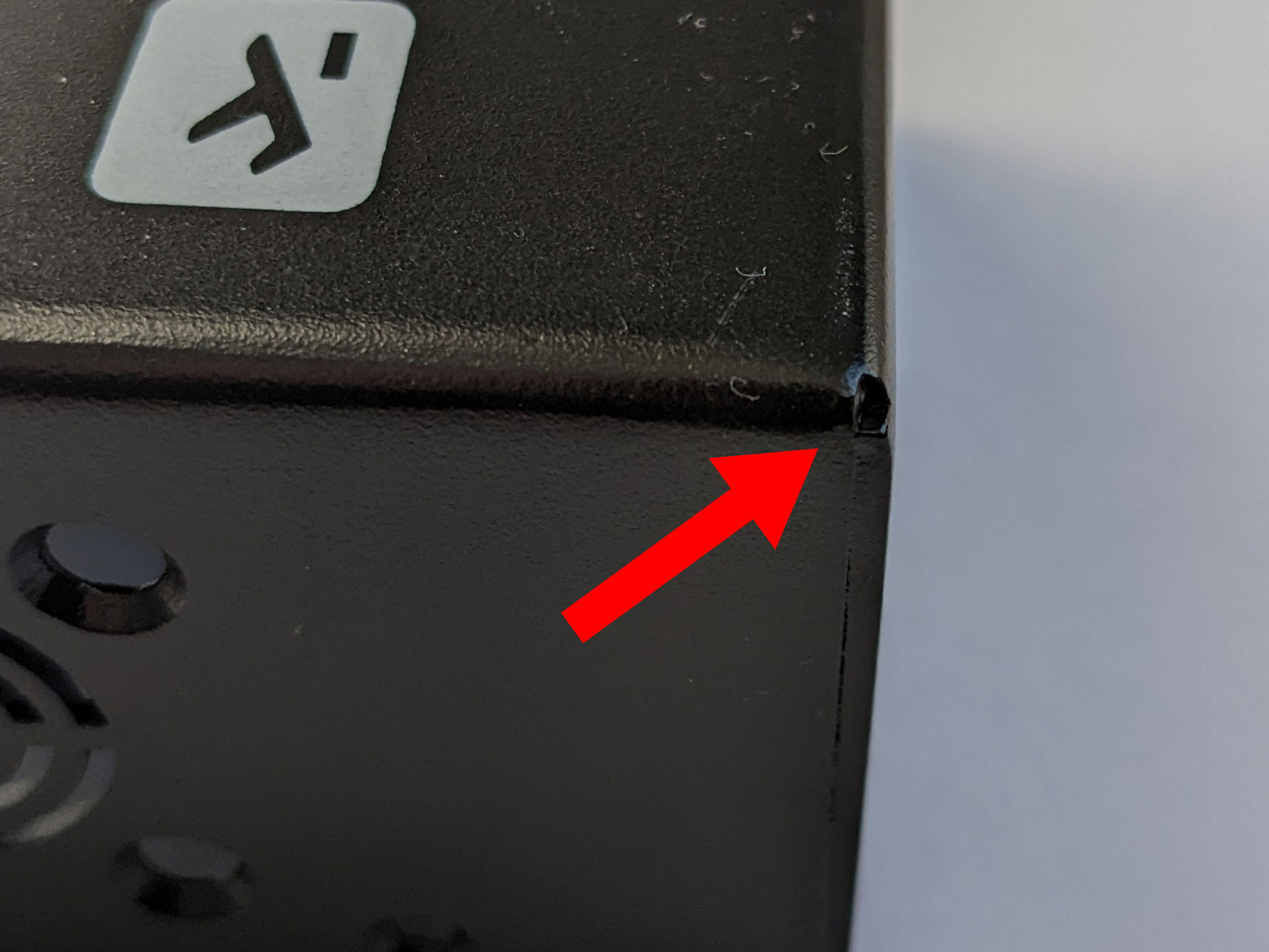 Photo of small hole in corner on Chinese vendor case