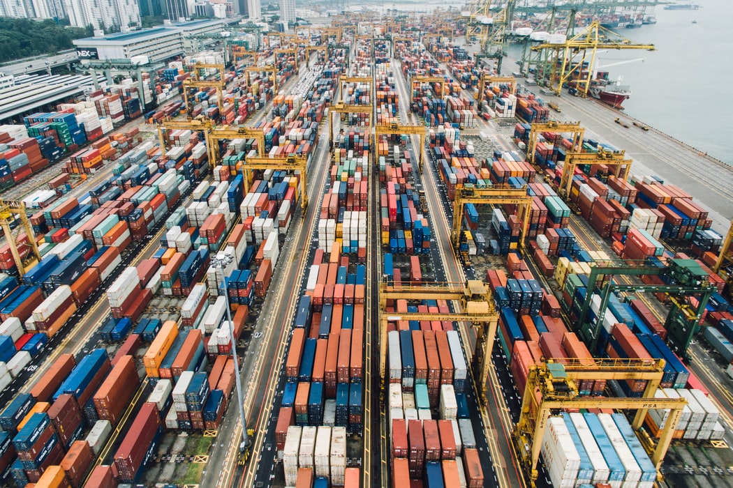 Stacks and rows of shipping containers. Credit: CHUTTERSNAP