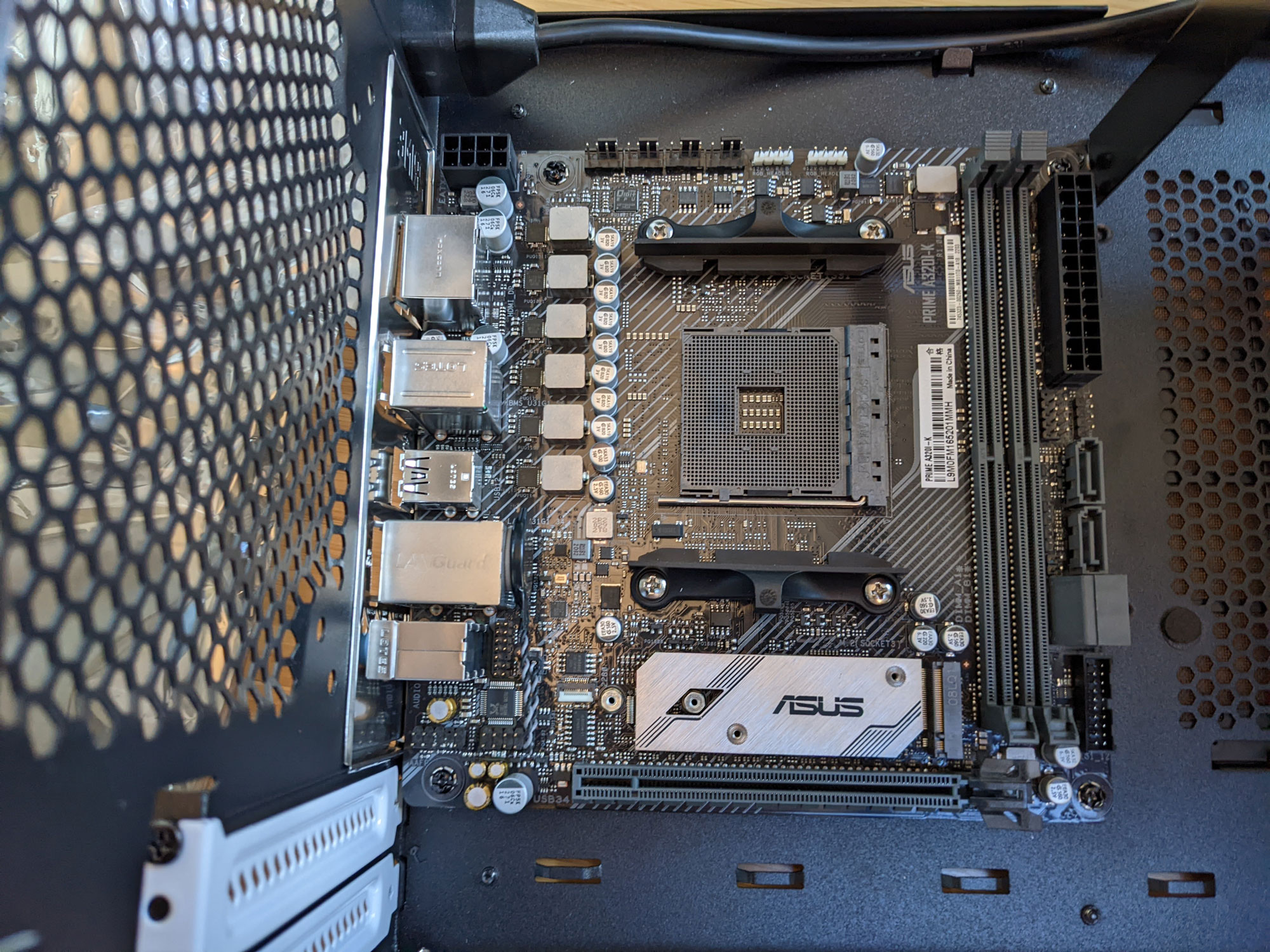 Photo of motherboard in the case