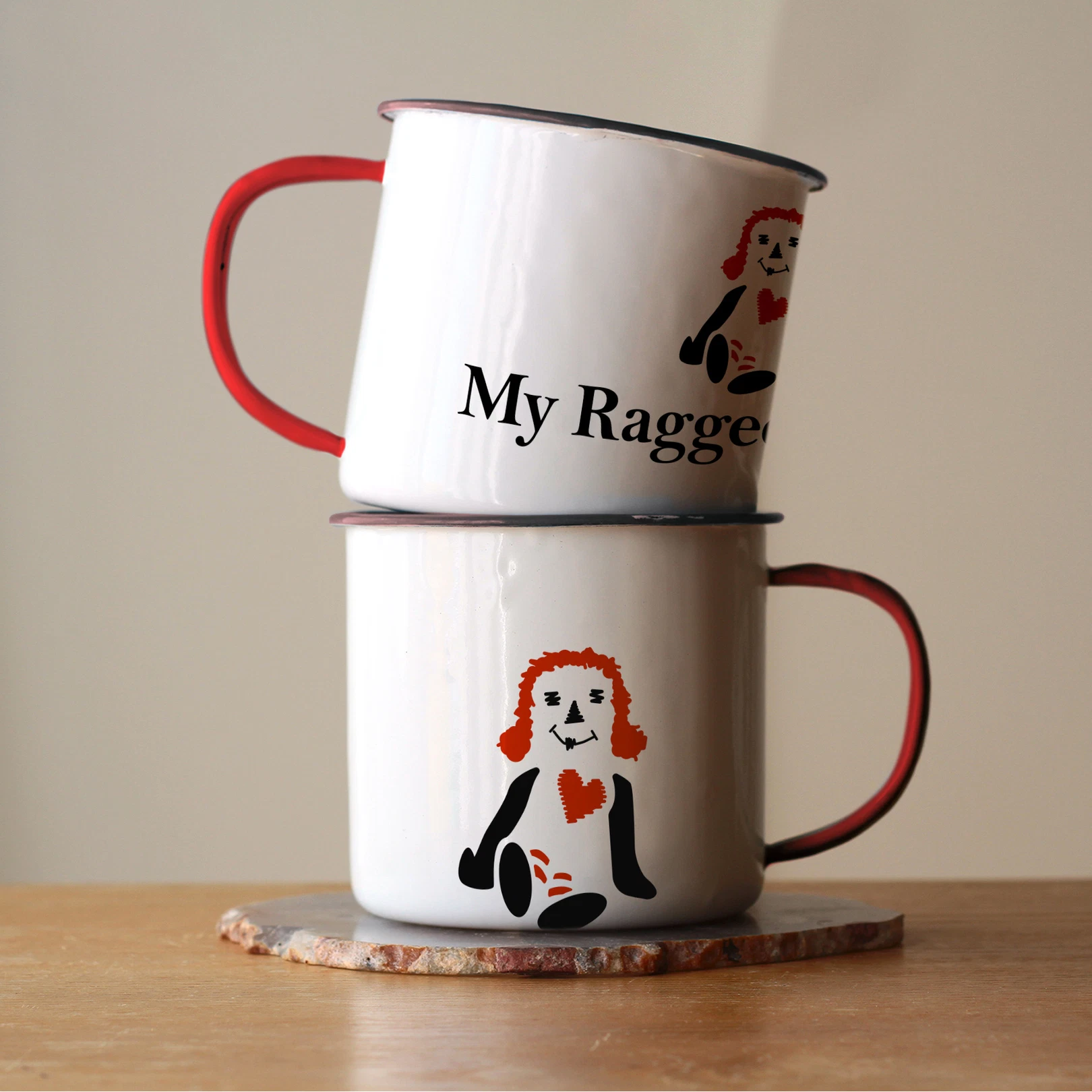 The logo of My Raggedy Herbs on a homemade mug.