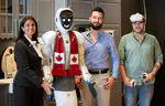 The Ambassador of Canada to Norway greets humanoid robot EVE at Halodi Robotics HQ