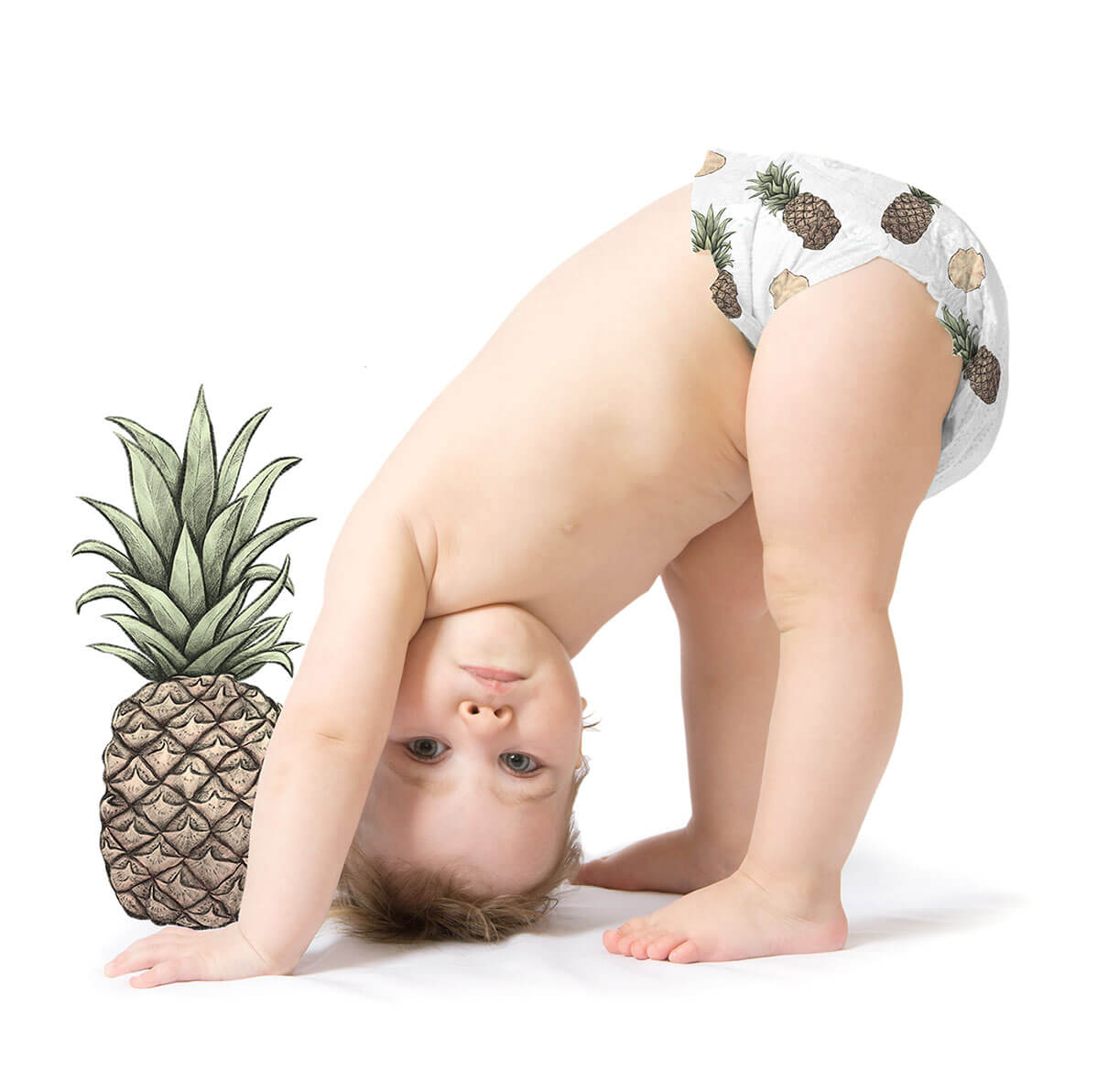 Baby with pineapple diapers
