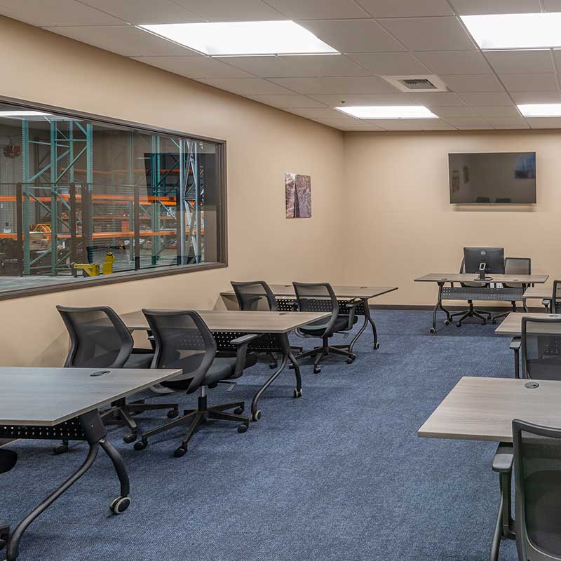 photo of training room with desks and chairs