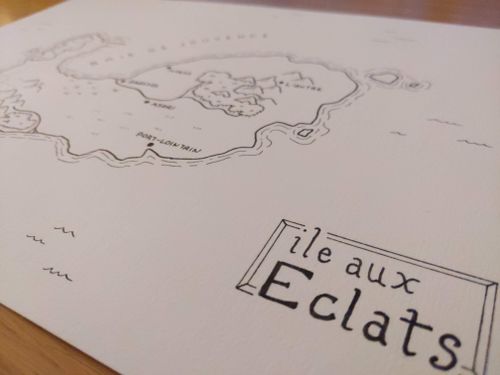 Zoom sur l'intitulé de la carte en bas à droite : L'ile aux éclats. On aperçoit l'île dans le fond.