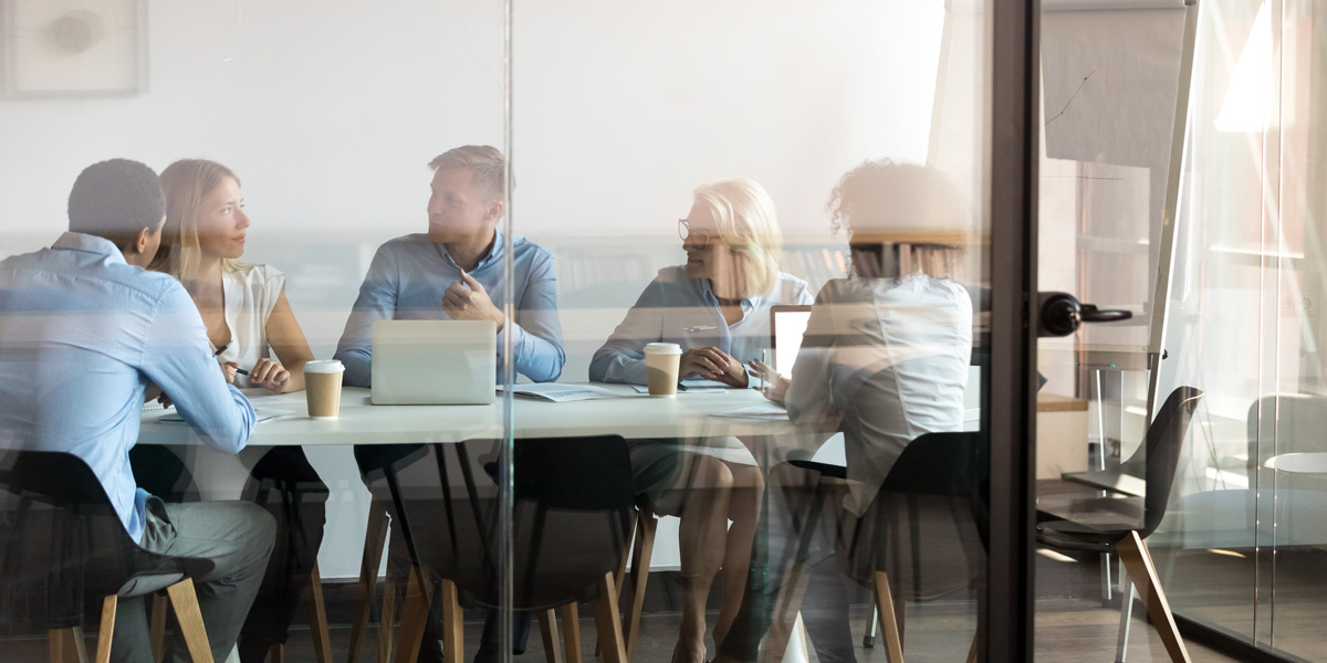 What is exploratory data analysis? A group of data analysts and business stakeholders sitting in a conference room
