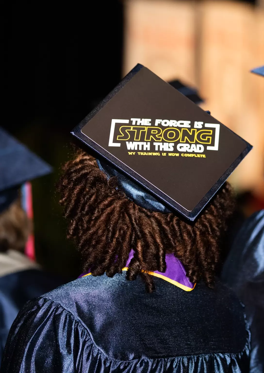 Graduate wearing a customized cap