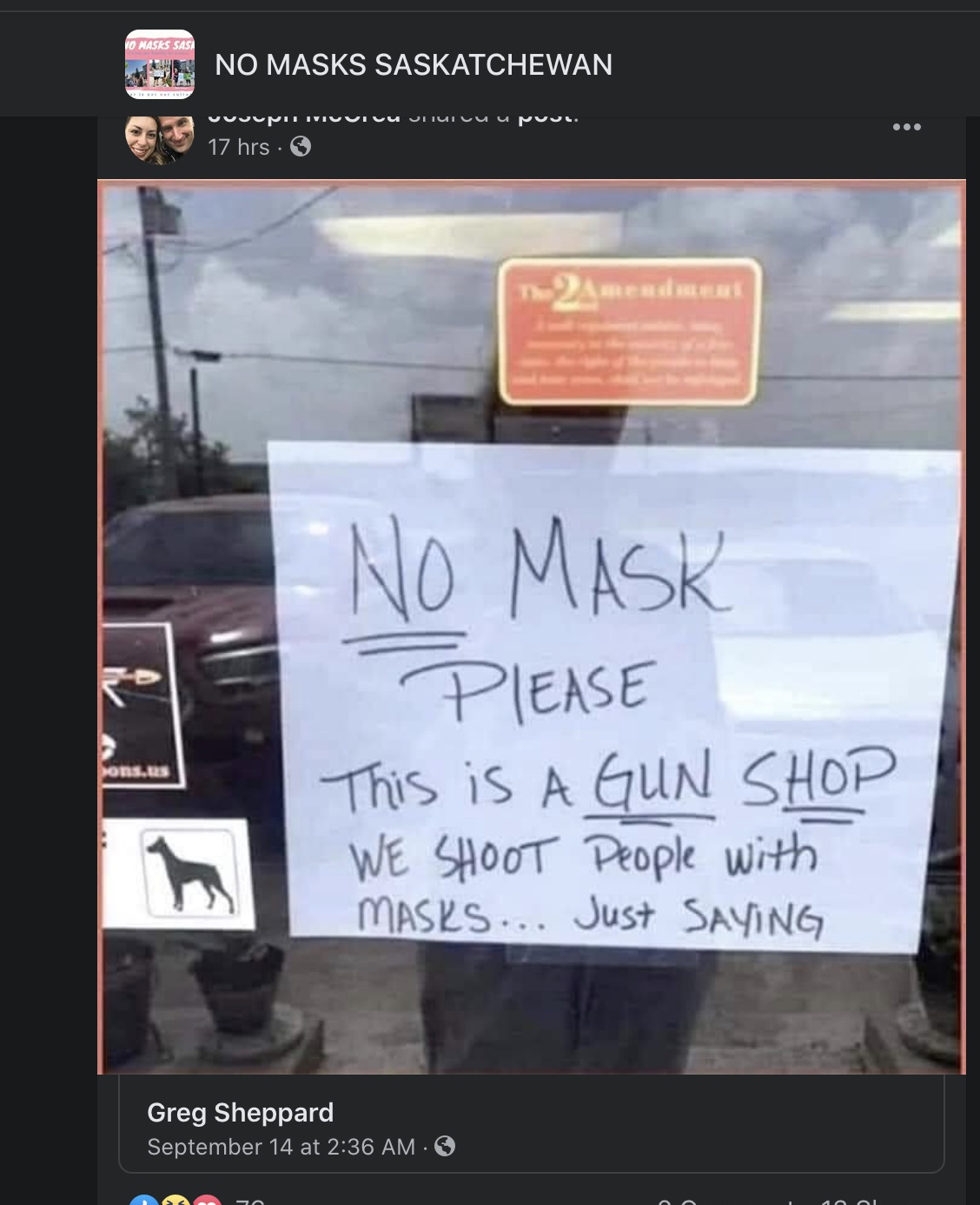 Sign saying that people who wear masks will be shot