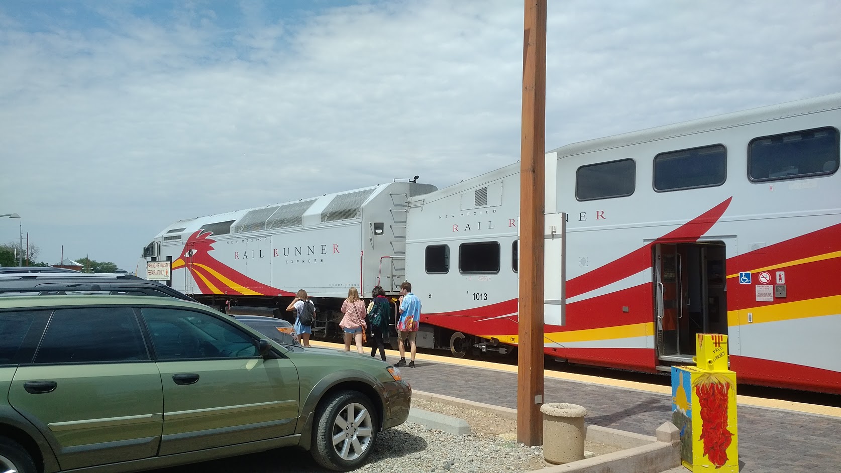 Santa Fe, NM RailRunneR train at station.