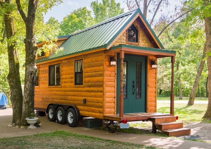 Outside view of this tiny log cabin in Missouri woods. Outside view of this tiny log cabin in Missouri woods.