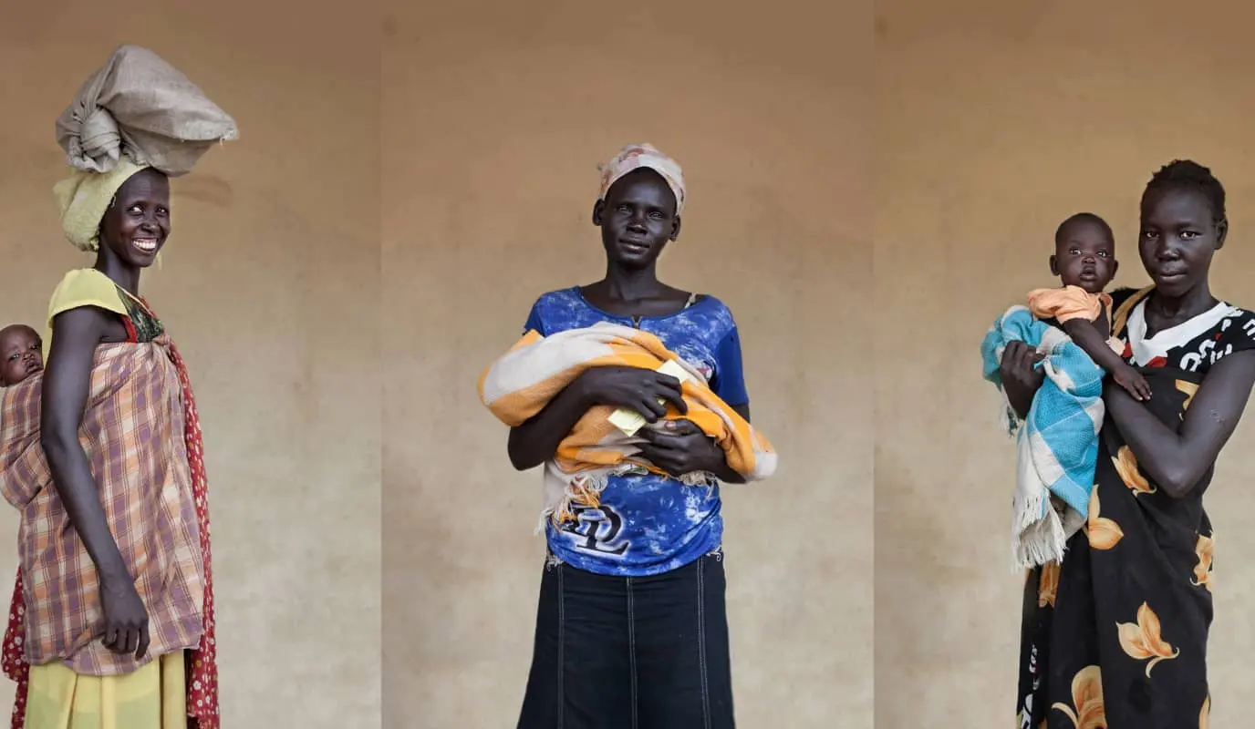 Three South Sudanese women with their children