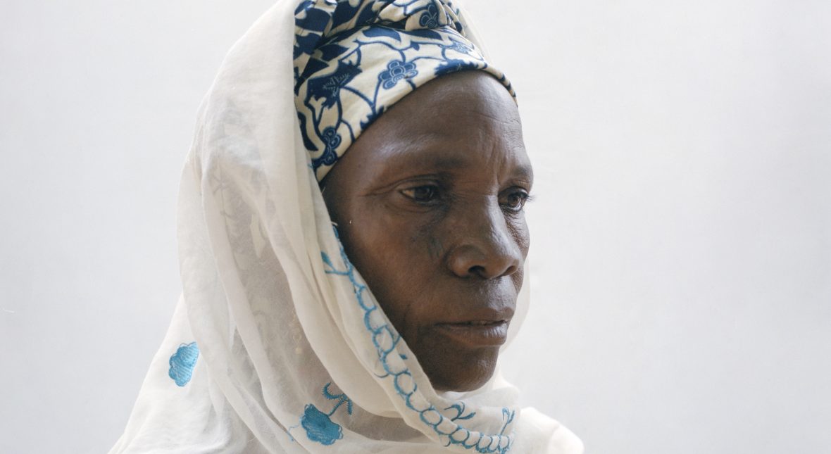 Portrait of Nigerien woman against a white backdrop