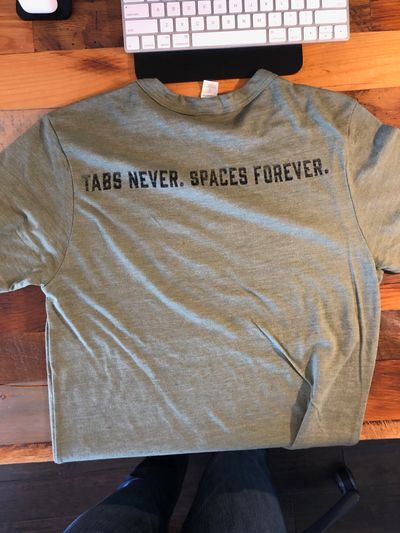 Chromatic t-shirt that says "tabs never. spaces forever."