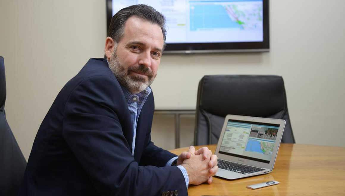 Image of Pondera CEO, Jon Coss in his office.