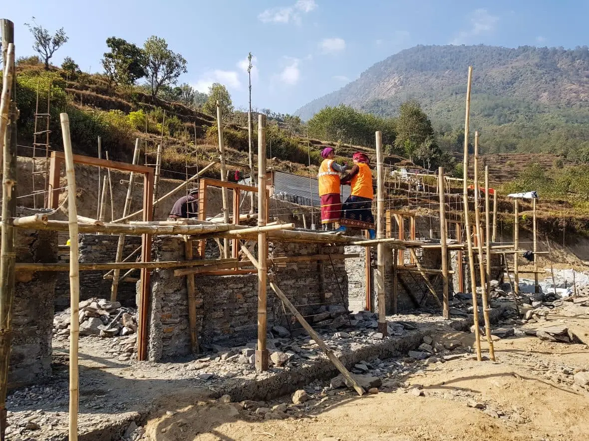 Local women working on the construction of an earthquake-resistant school in Gorkha district.