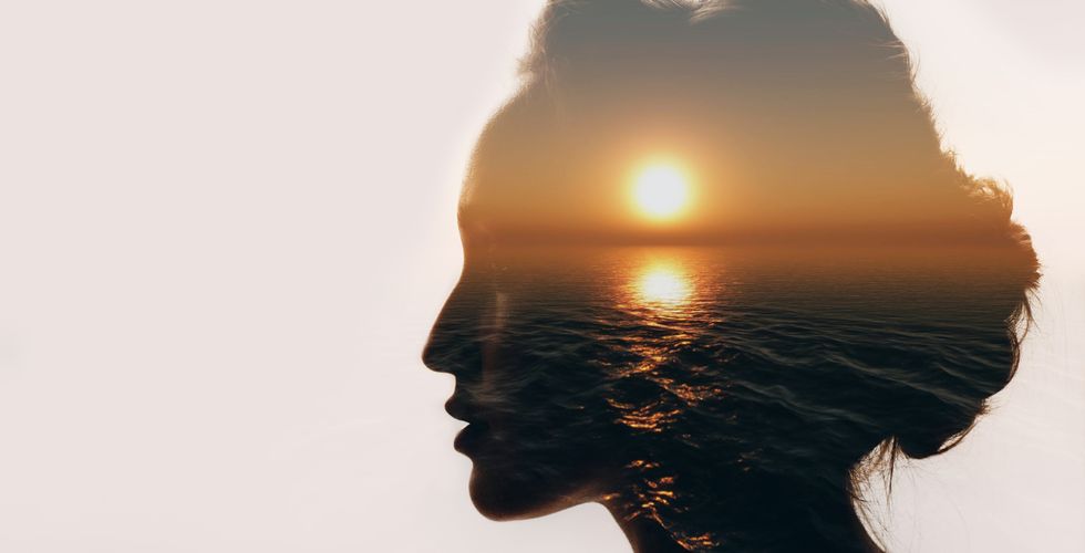 sunset in a woman's silhouette