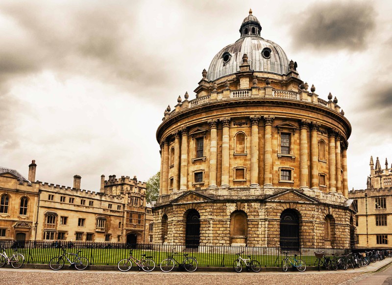 An angled view of the dome in Radcliffe Square at Oxford University on a cloudy day