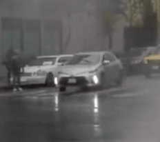 Headlight reflection from a car in the rain