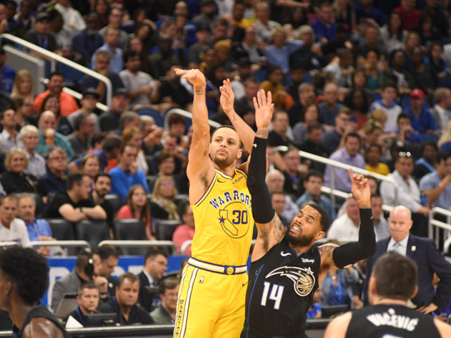 One of the NBA's best, Steph Curry shooting a ball